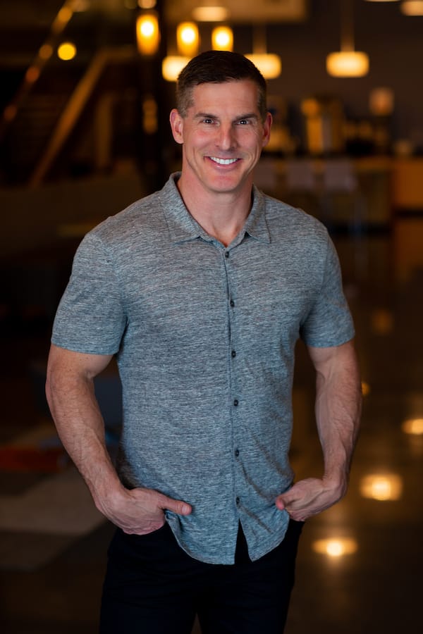 Craig Groeschel wearing a grey shirt with his hands in the pockets of his jeans