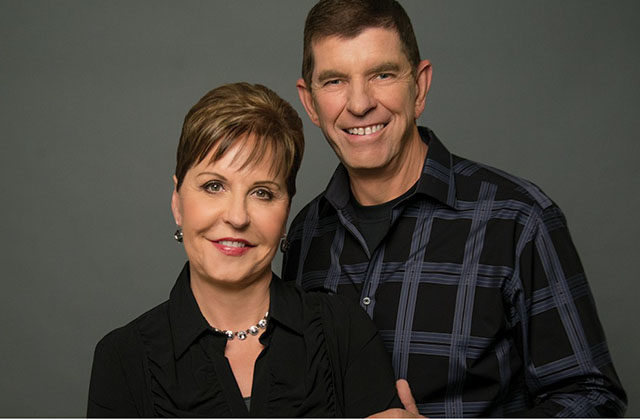 Joyce Meyer standing with husband in a black shirt