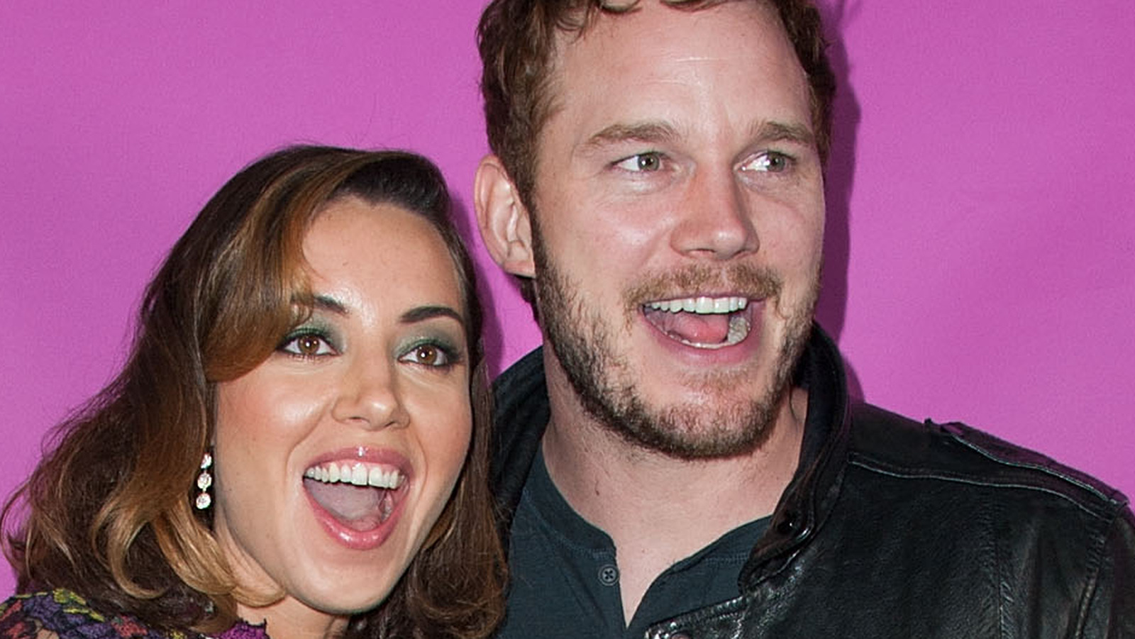 Chris Pratt And Aubrey Plaza smiling on camera in an event