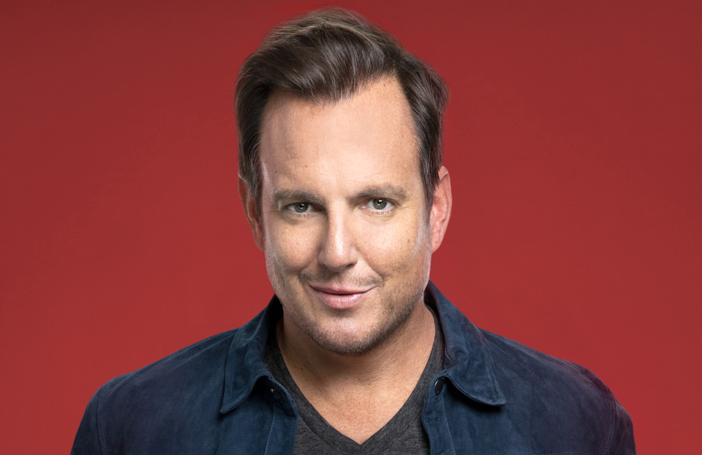 Will Arnett wearing a blue sleeves while looking at the camera