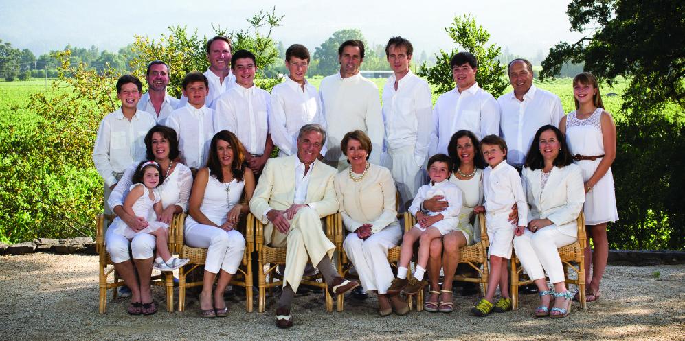 Family of Jacqueline Pelosi all wearing white