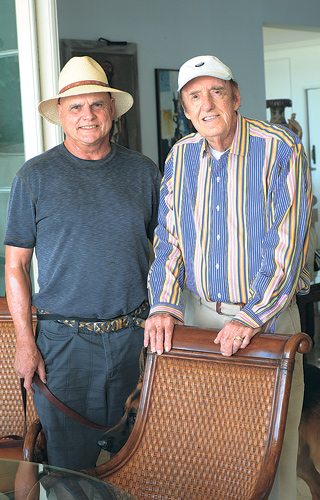 Stan Cadwallader in Panama hat and blue T-shirt and Jim Nabors in white cap and striped long sleeve shirt