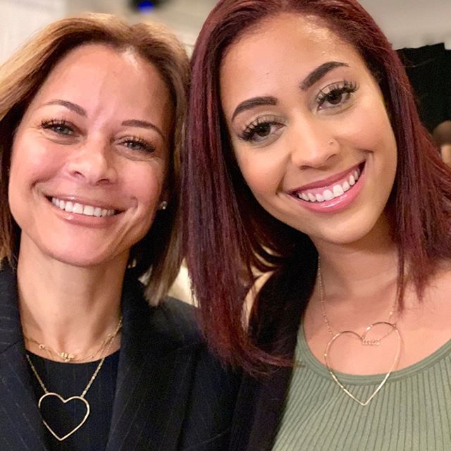 Sonya Curry with her daughter, Sydel Curry-Lee, both wearing a necklace with a big heart pendant