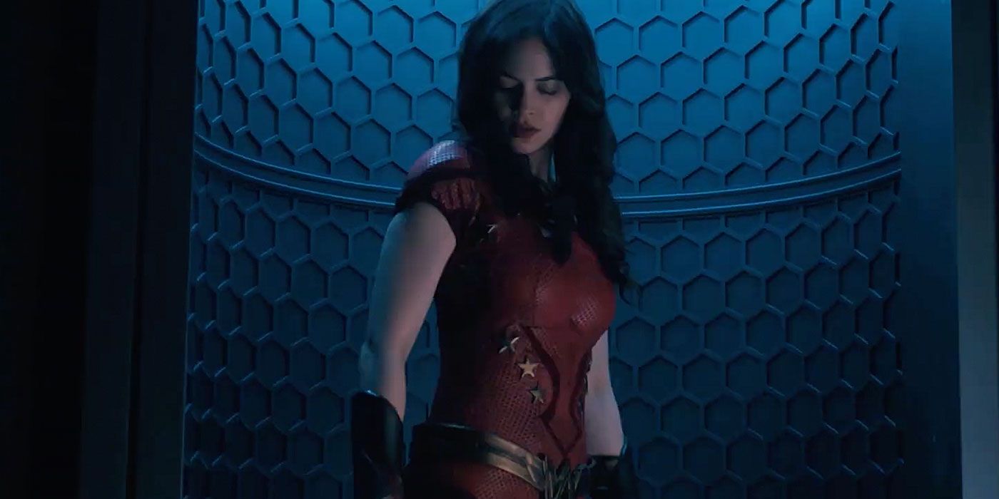 Conor Leslie in a tight fit red costume with stars as Wonder Girl in 'Titans'