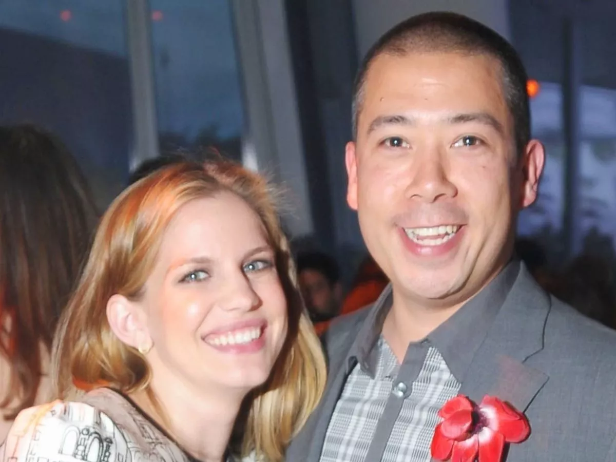 Shaun So wearing gray suit while smiling and Anna Chlumsky wearing a white attire while smiling
