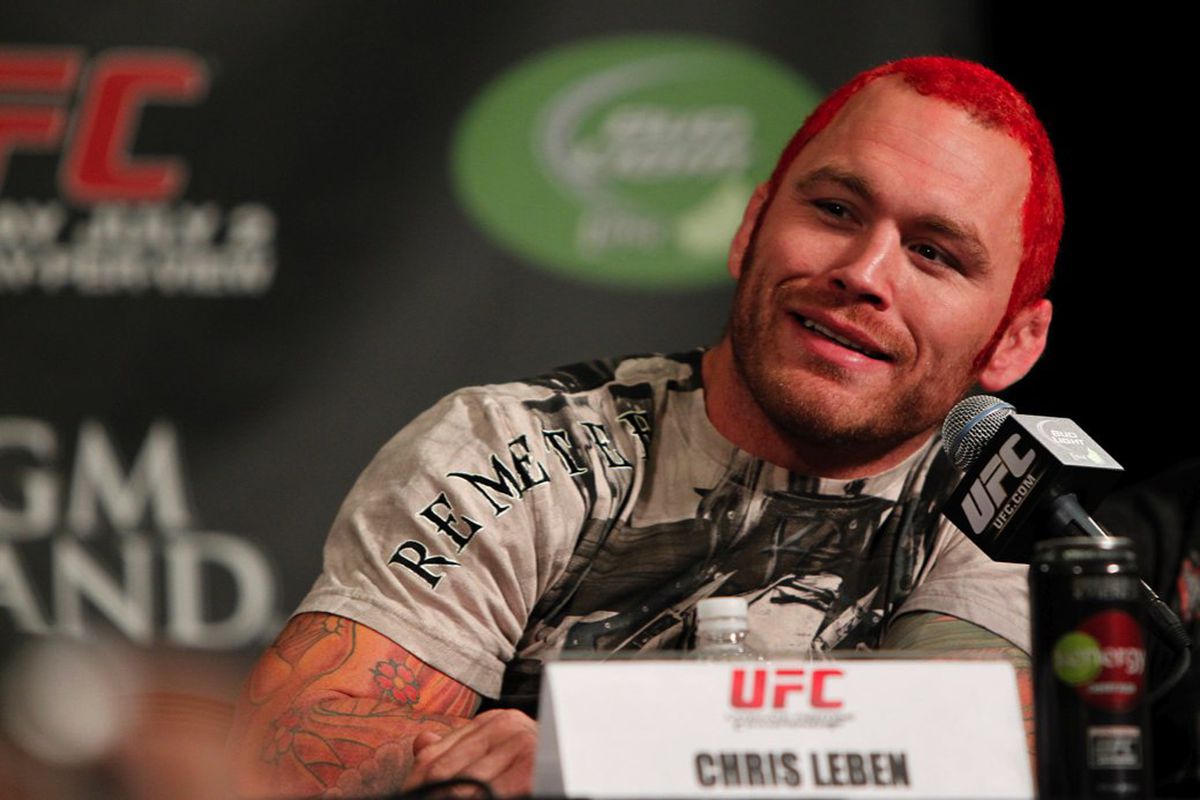 Chris Leben in a press conference with red hair