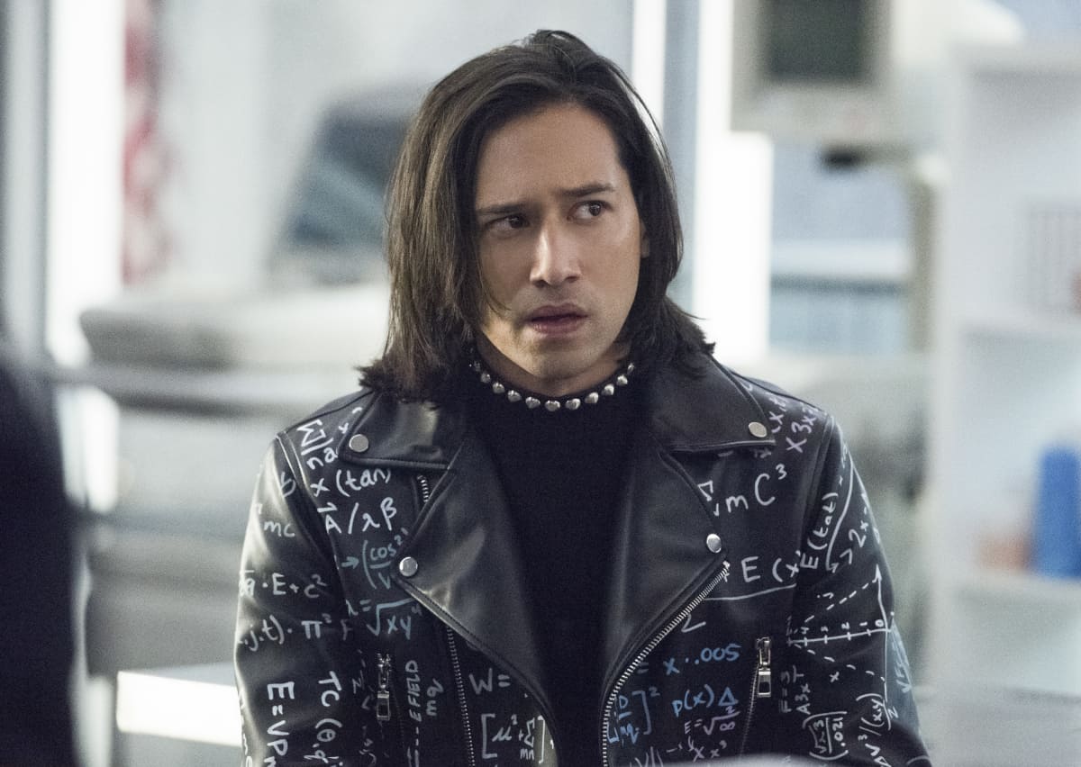 Jesse Rath wearing black jacket with mathematical equations written on it