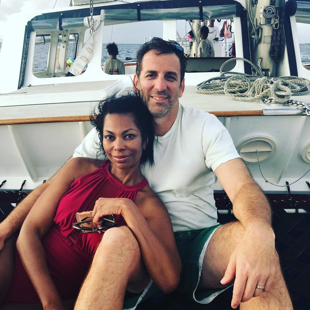 Tony berlin and harris faulkner sitting together in a yacht