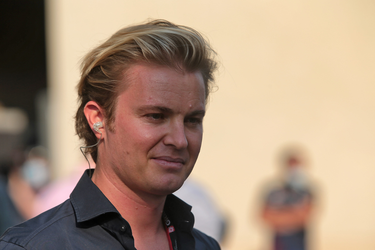 Nico rosberg in black with ear piece