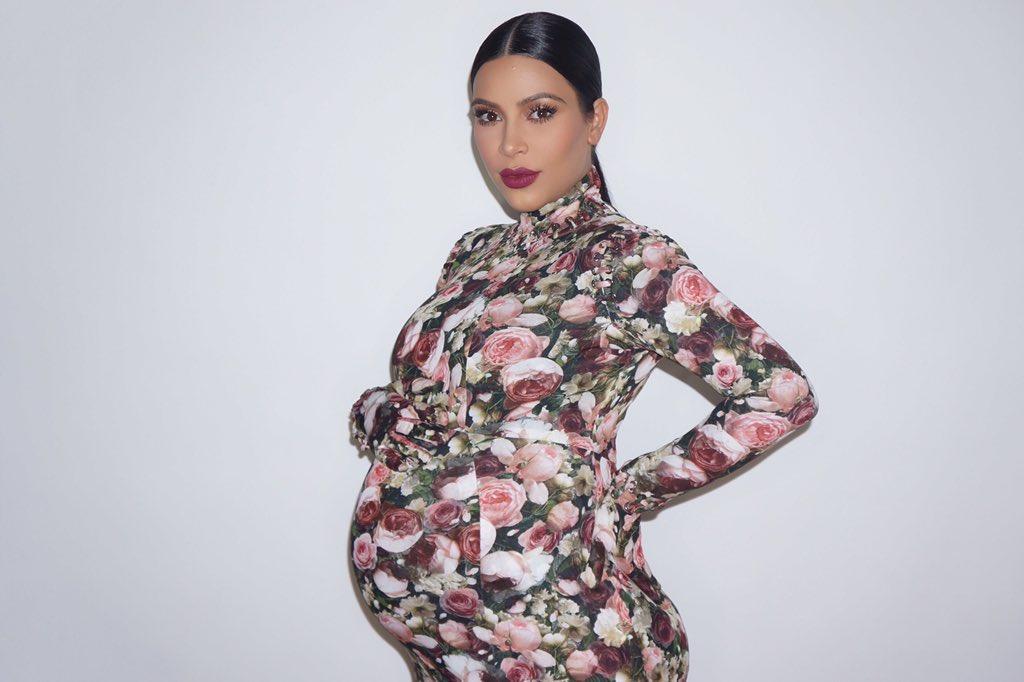 Kim Kardashian in a floral long sleeves dress