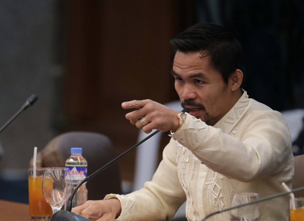 Manny Pacquiao wearing a Filipino barong while giving a speech at the Senate