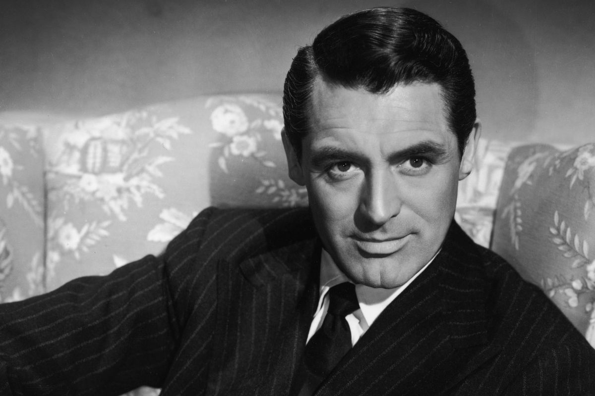 Smiling Cary Grant wearing a suit