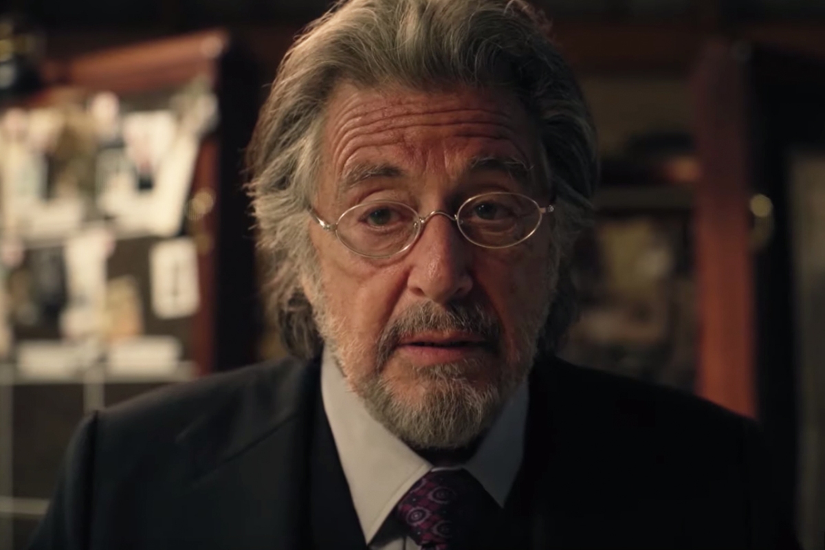 Al Pacino in a suit and eyeglasses