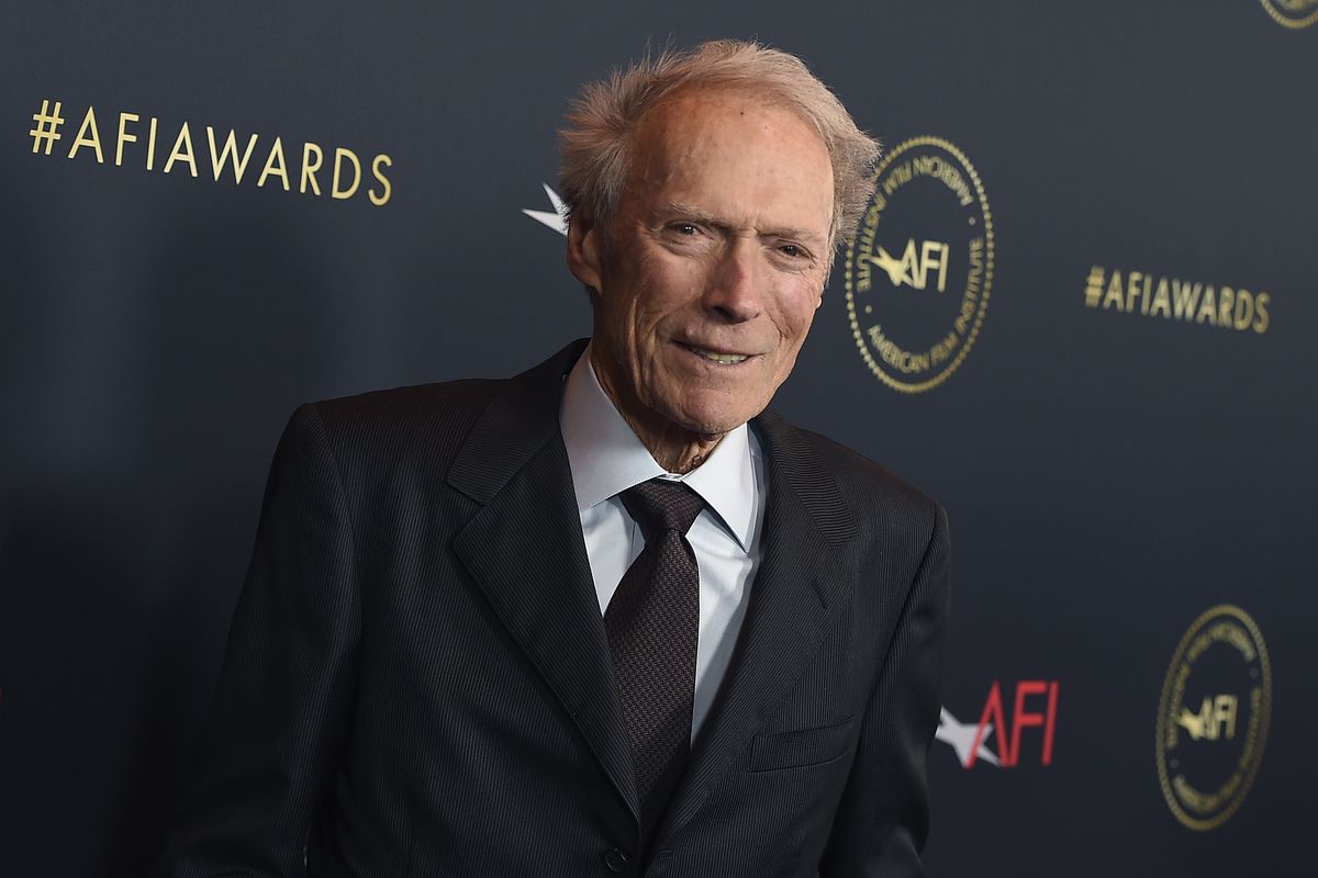Clint Eastwood in a suit in an awards show