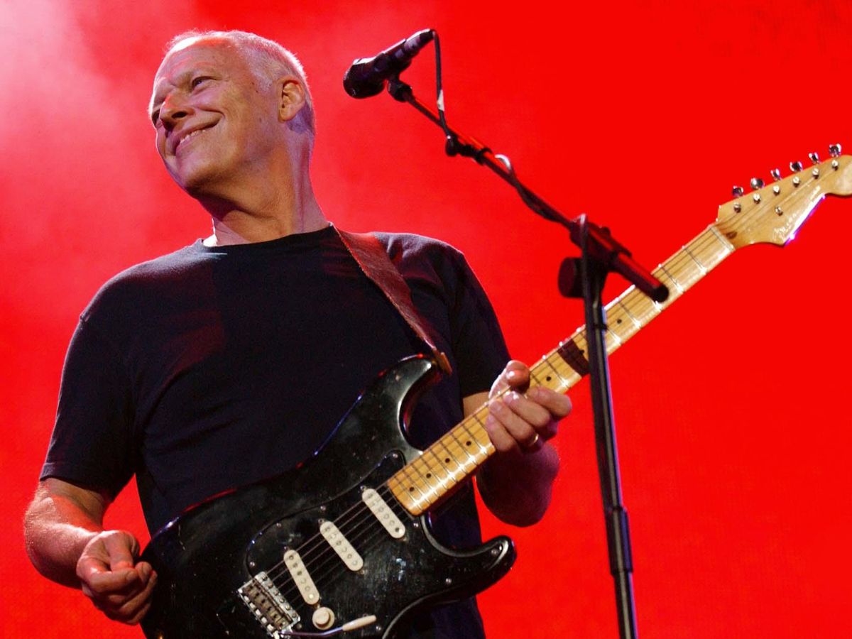 David Gilmour On Stage With His Guitar