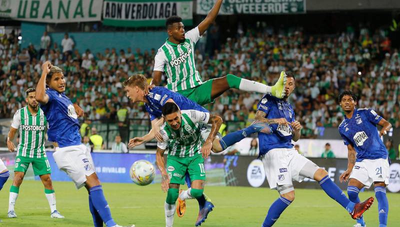 Alejandro Bernal In Green Shirt Running During A Football Match