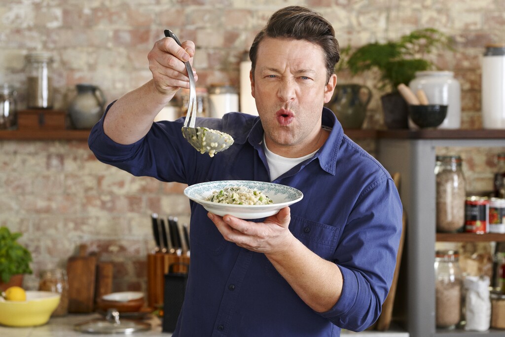 Jamie Oliver With A Plate In Hand