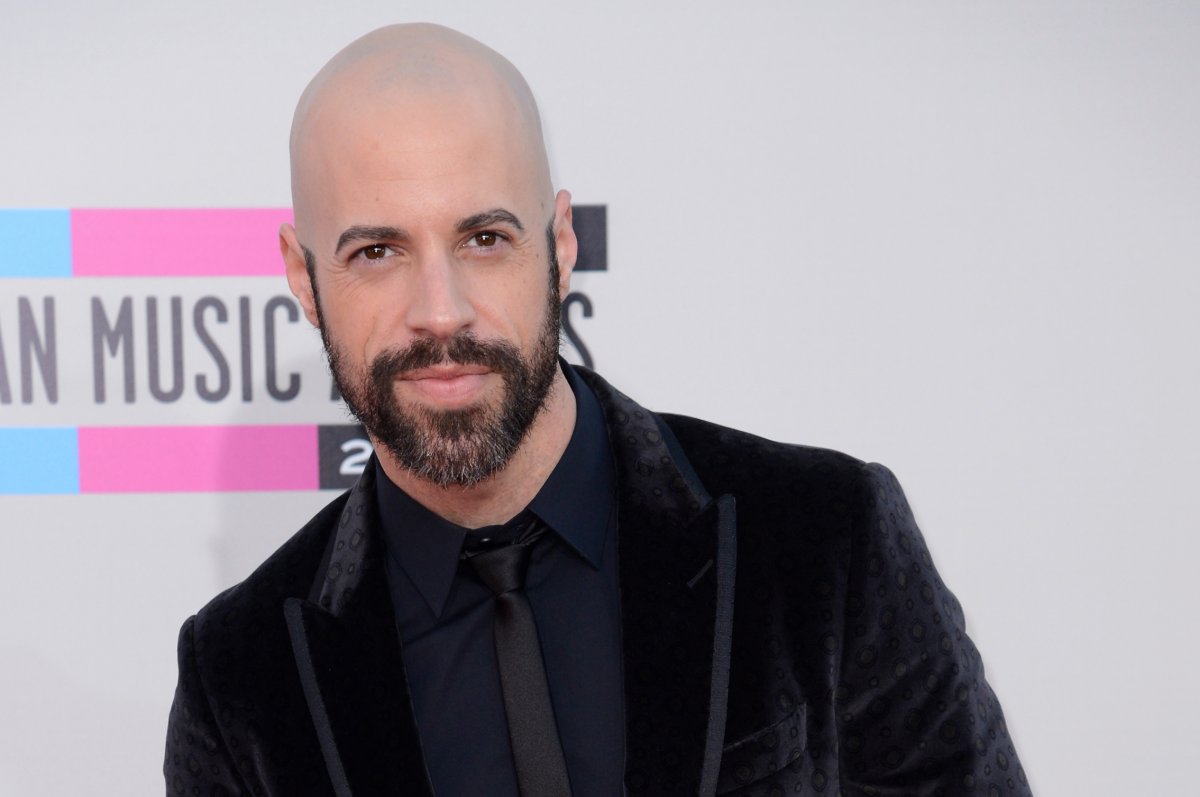Chris Daughtry wearing an all black suit attending an event