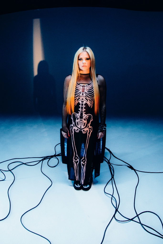 Avril Lavigne wearing a skeleton bodycon dress