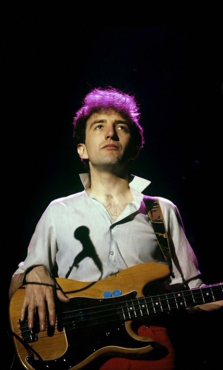 Jonh Deacon On Stage With His Guitar