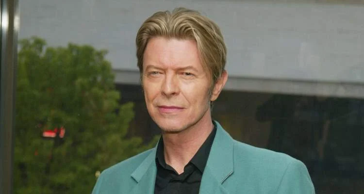 David Bowie Wearing A Green Suit