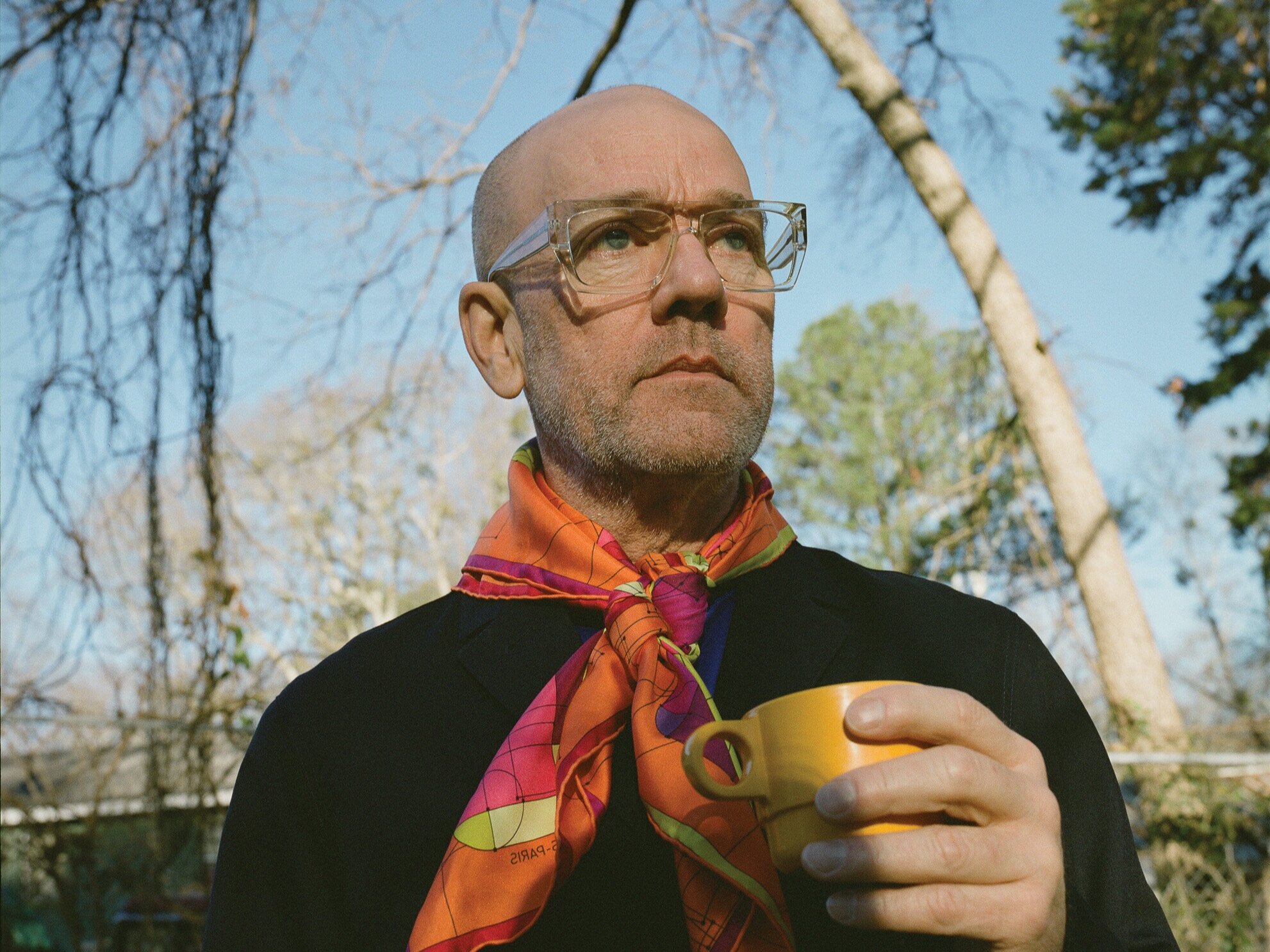 Michael Stipe Holding A Yellow Cup