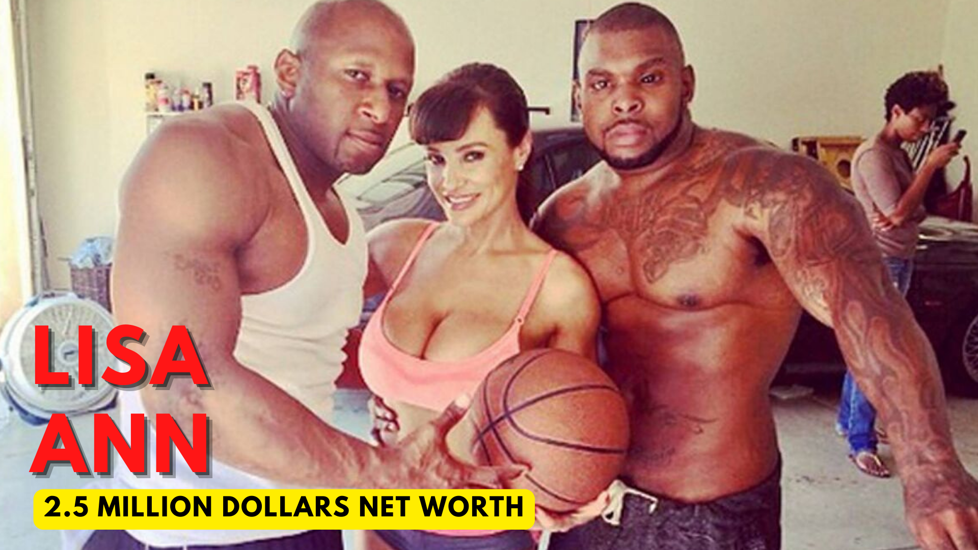 Lisa Ann holding a ball with two black men beside her