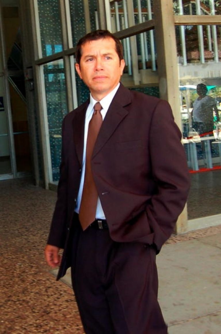 Jose Trinidad Marin wearing a maroon suit