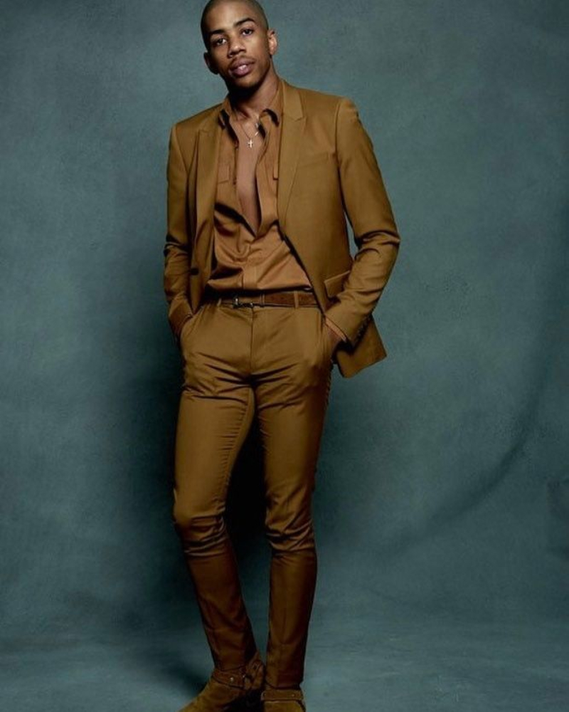 Wynton Harvey wearing a brown suit