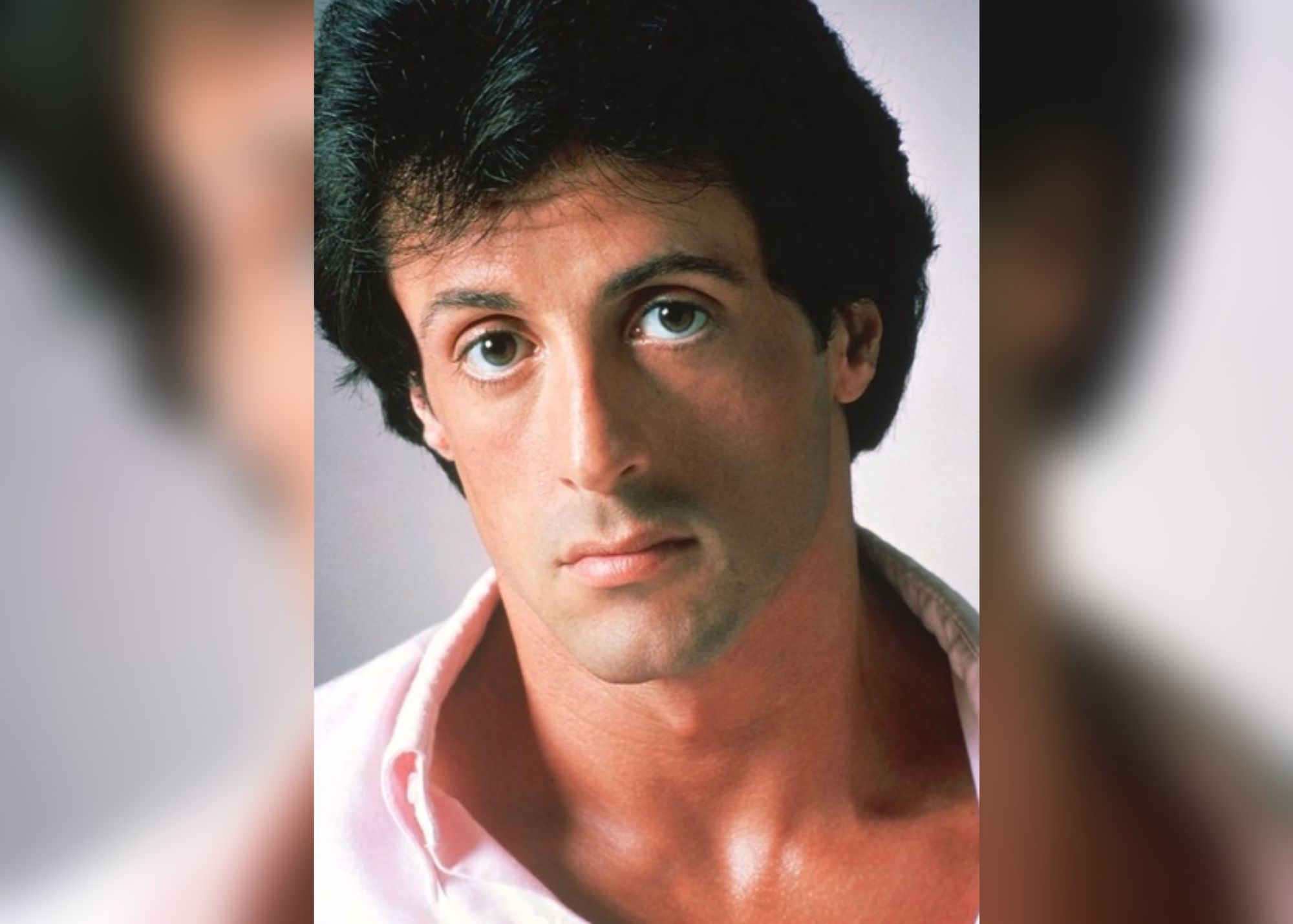 Sylvester Stallone showing a serious face as well as his sanpaku eyes