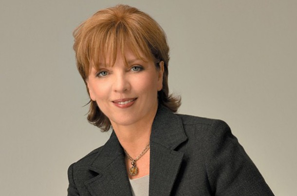 Nora Roberts wearing a gray suit