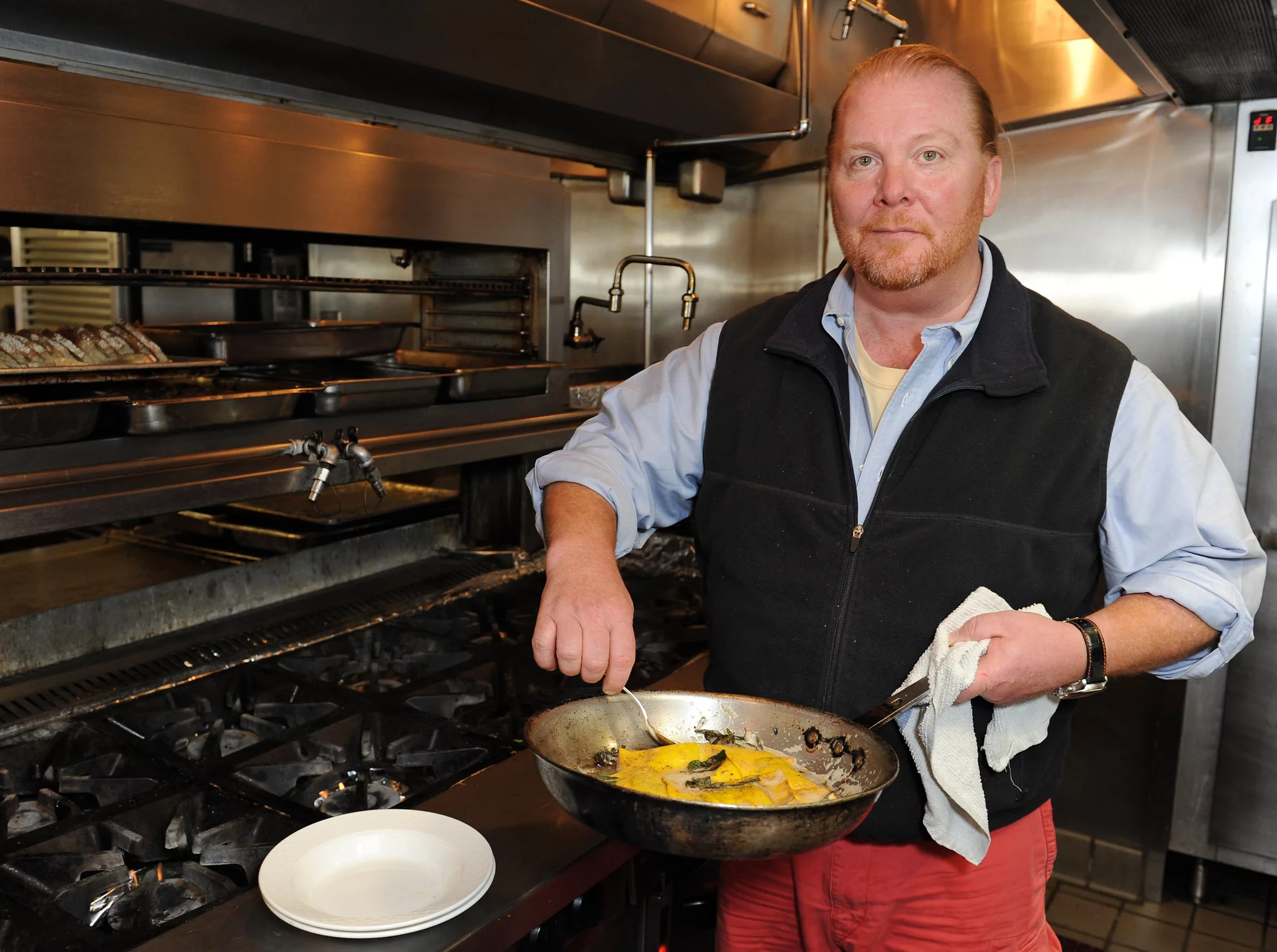 Mario Batali Cooking an omelet in a pan