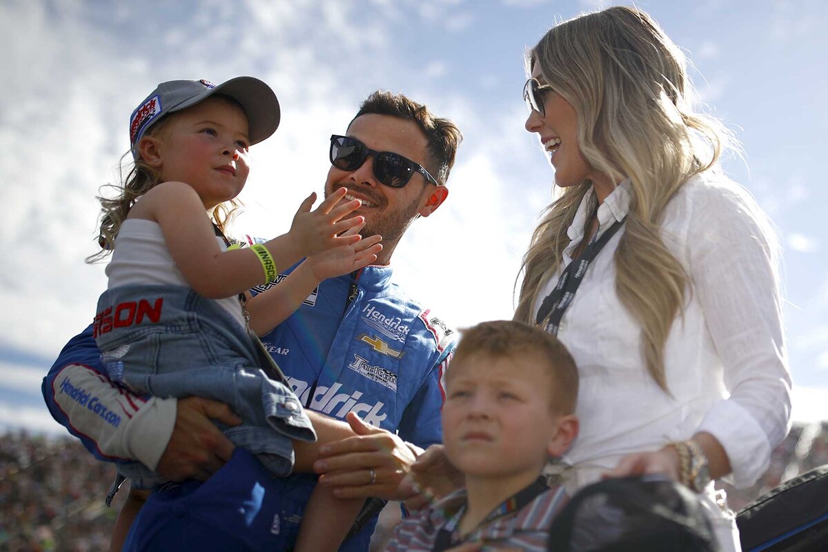 Kyle Larson with his wife and two children