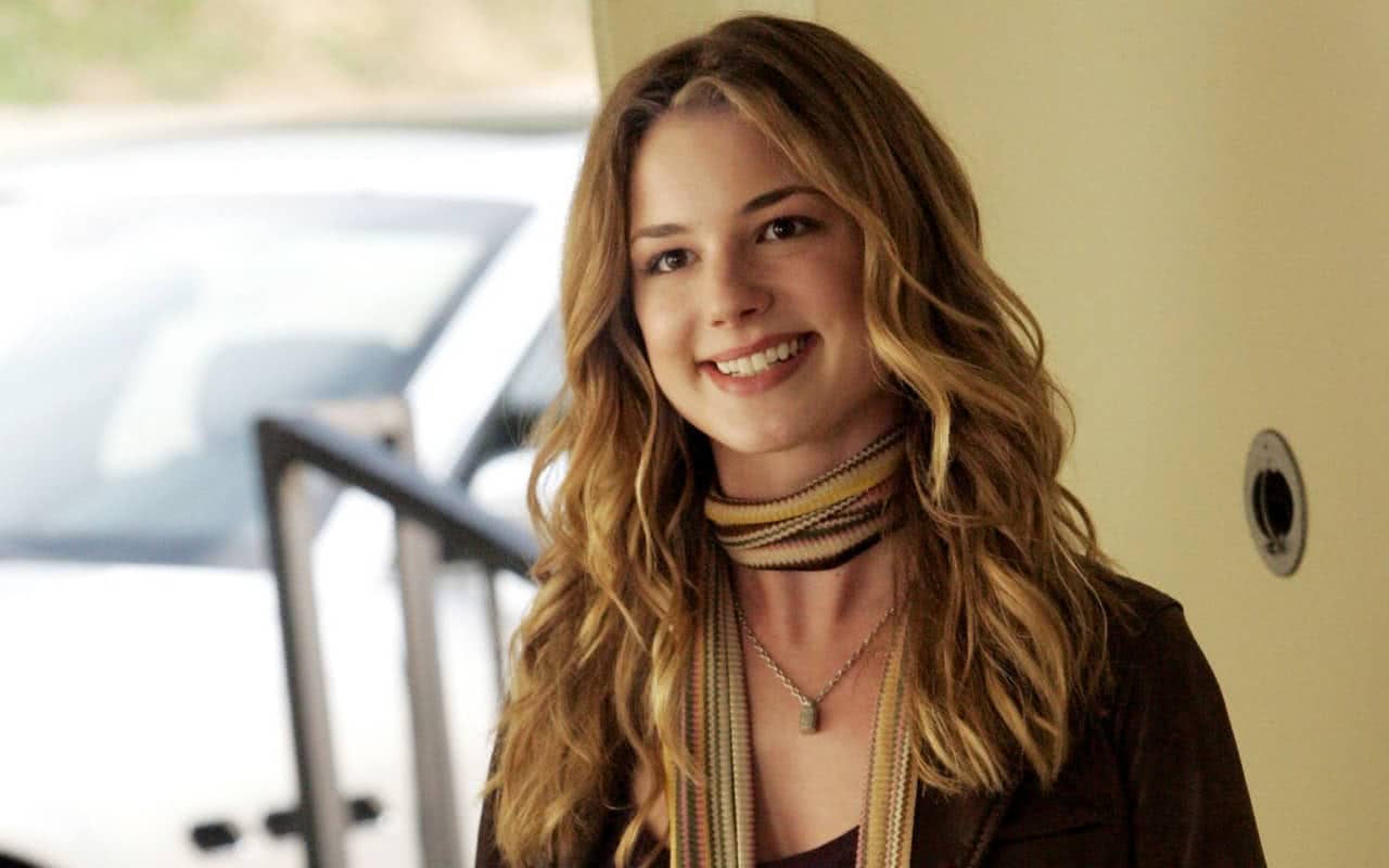 Emily VanCamp wearing a scarf and black top