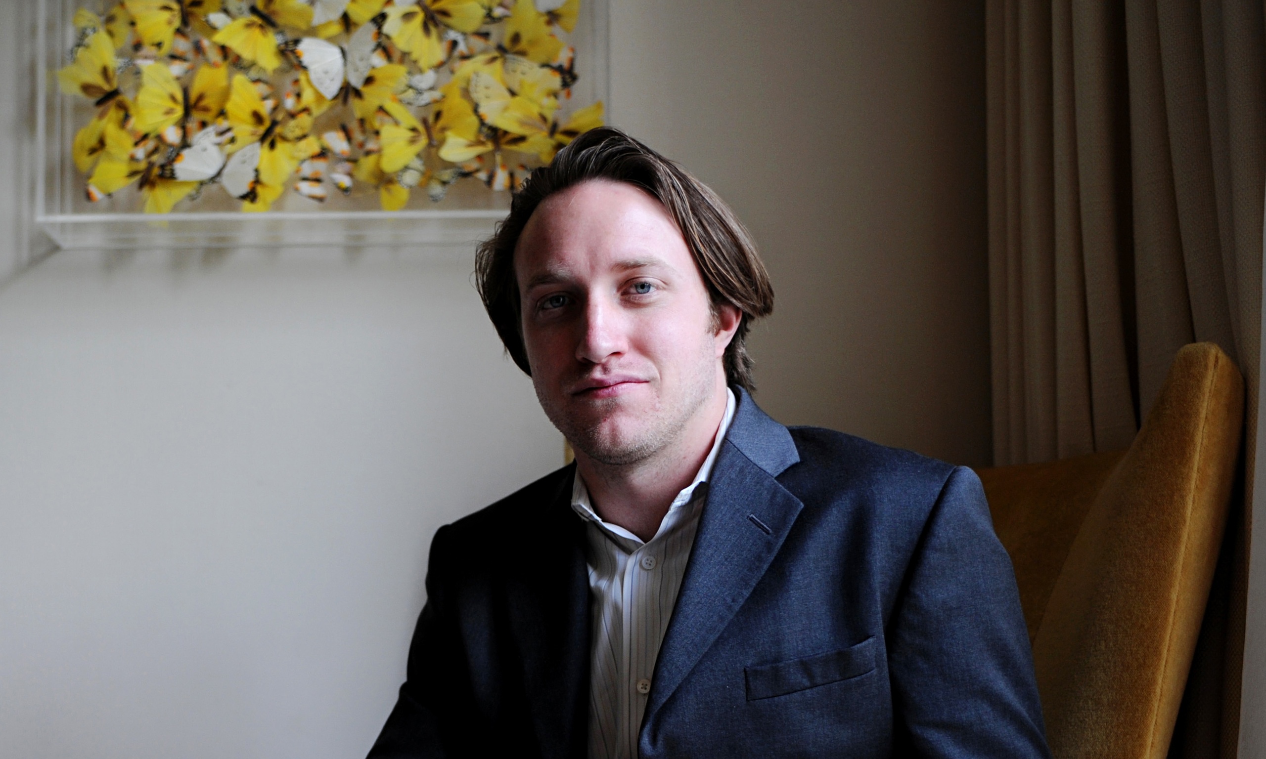 Chad Hurley wearing a blue coat