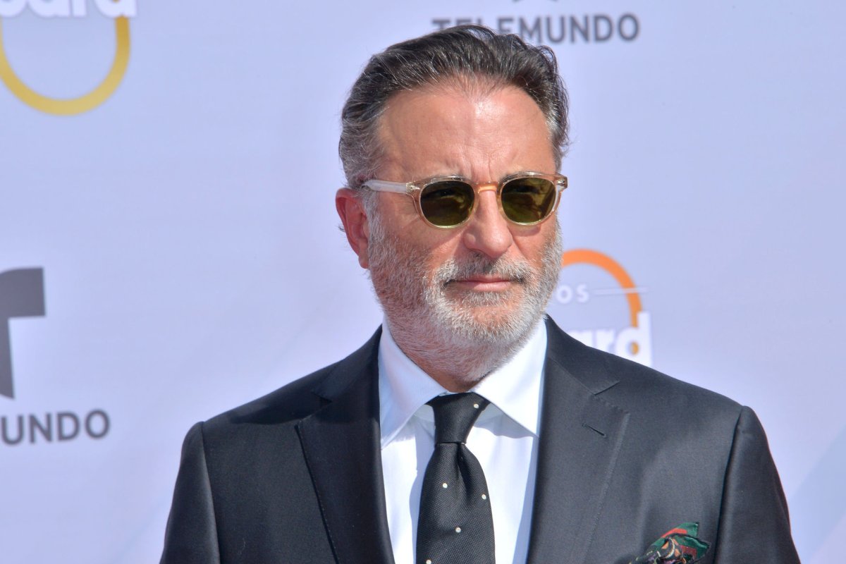 Andy Garcia wearing a black suit and sunglasses
