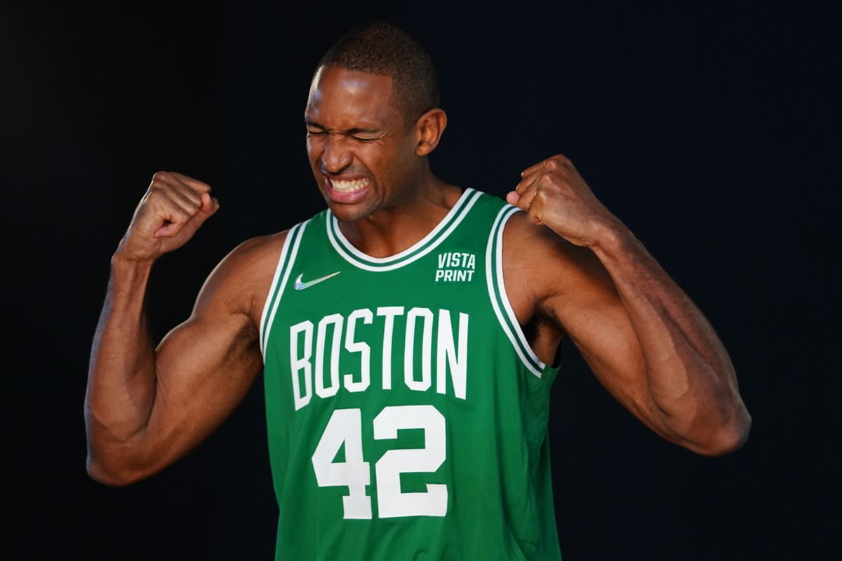 Al Horford wearing a green basketball jersey