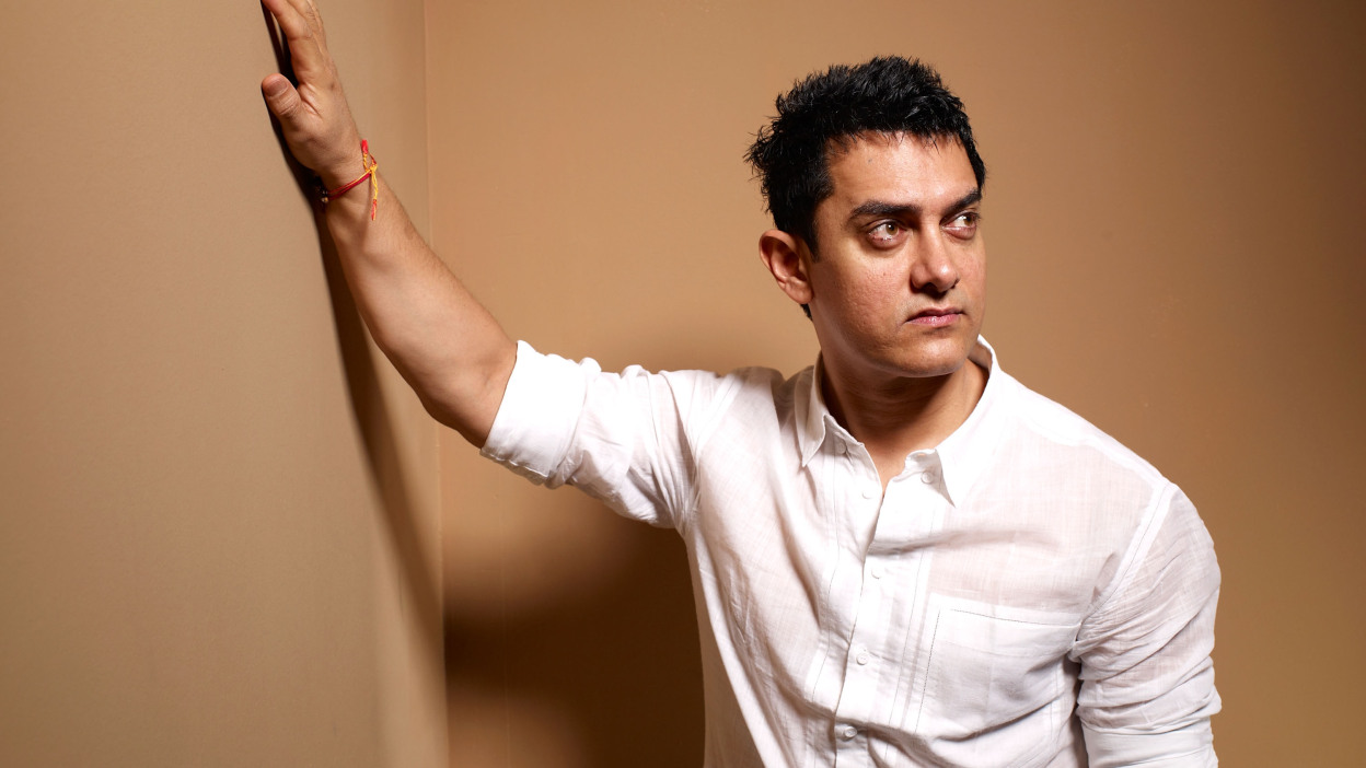 Aamir Khan wearing a black polo long sleeves