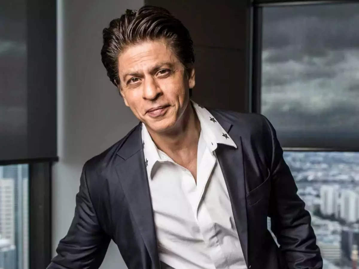 Shah Rukh Khan wearing a black suit