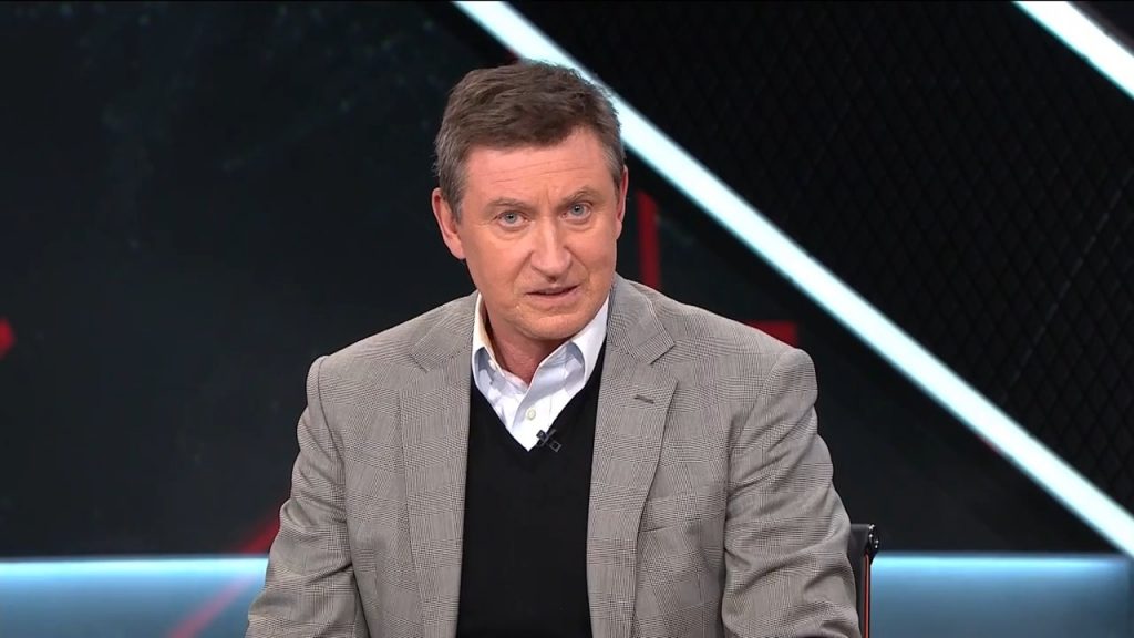 Gretzky wearing gray coat