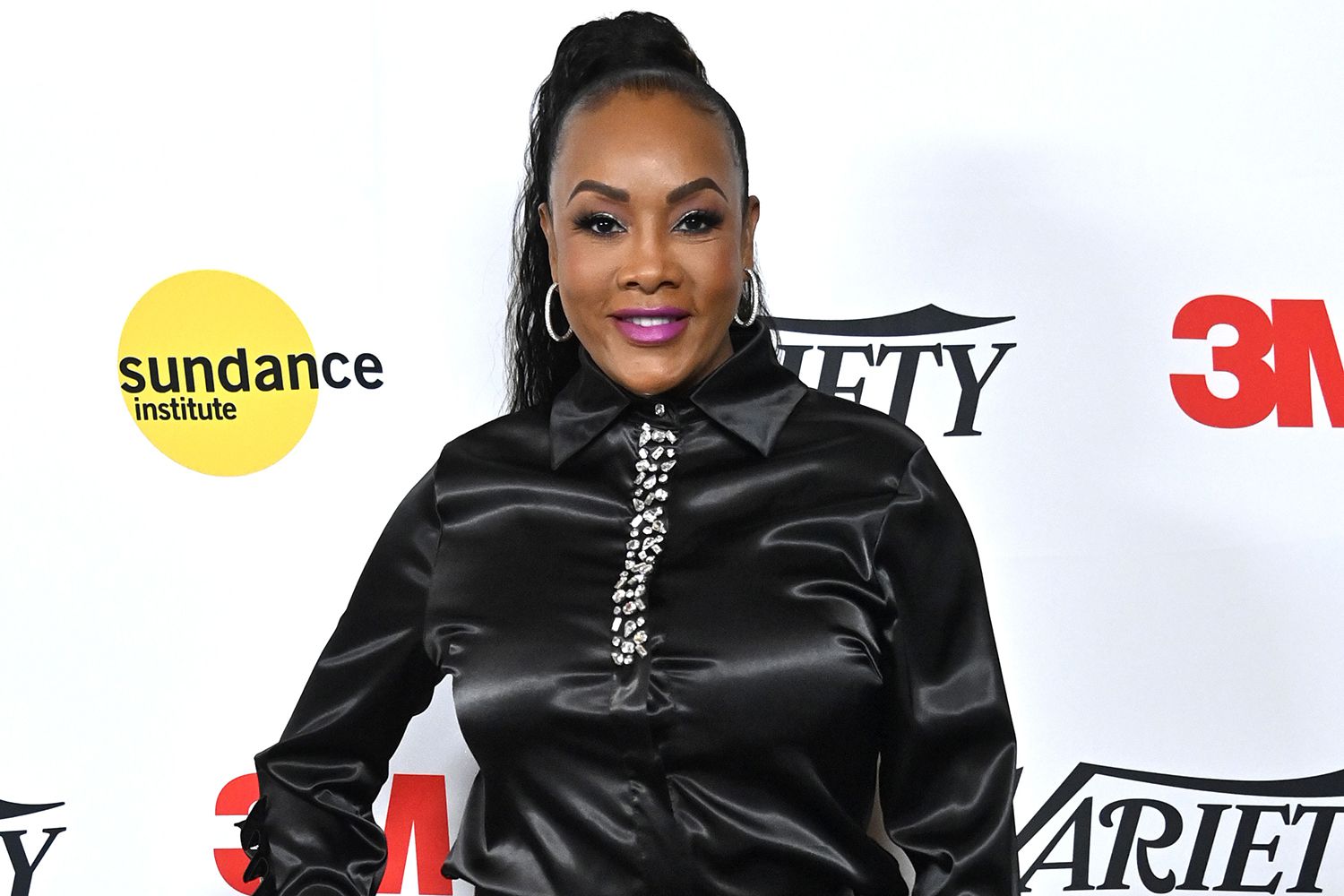 Vivica Fox wearing a black outfit