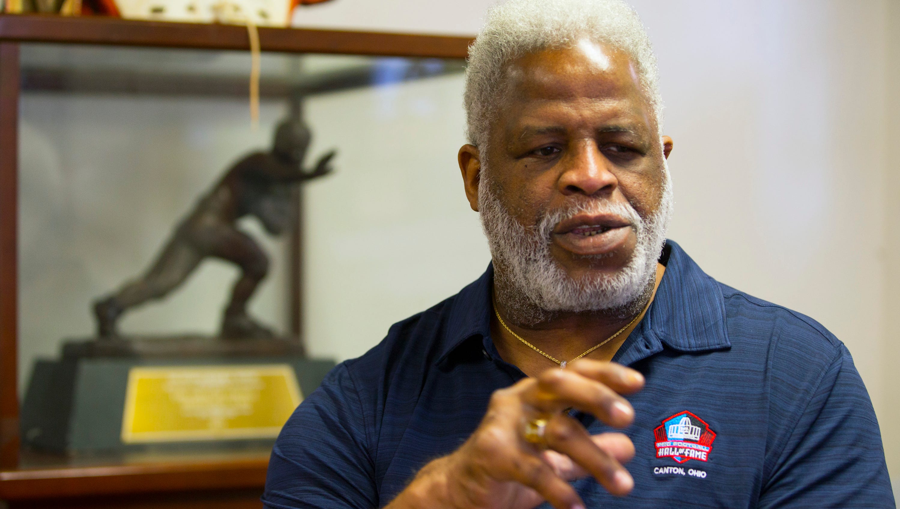 Earl Campbell wearing blue polo shirt