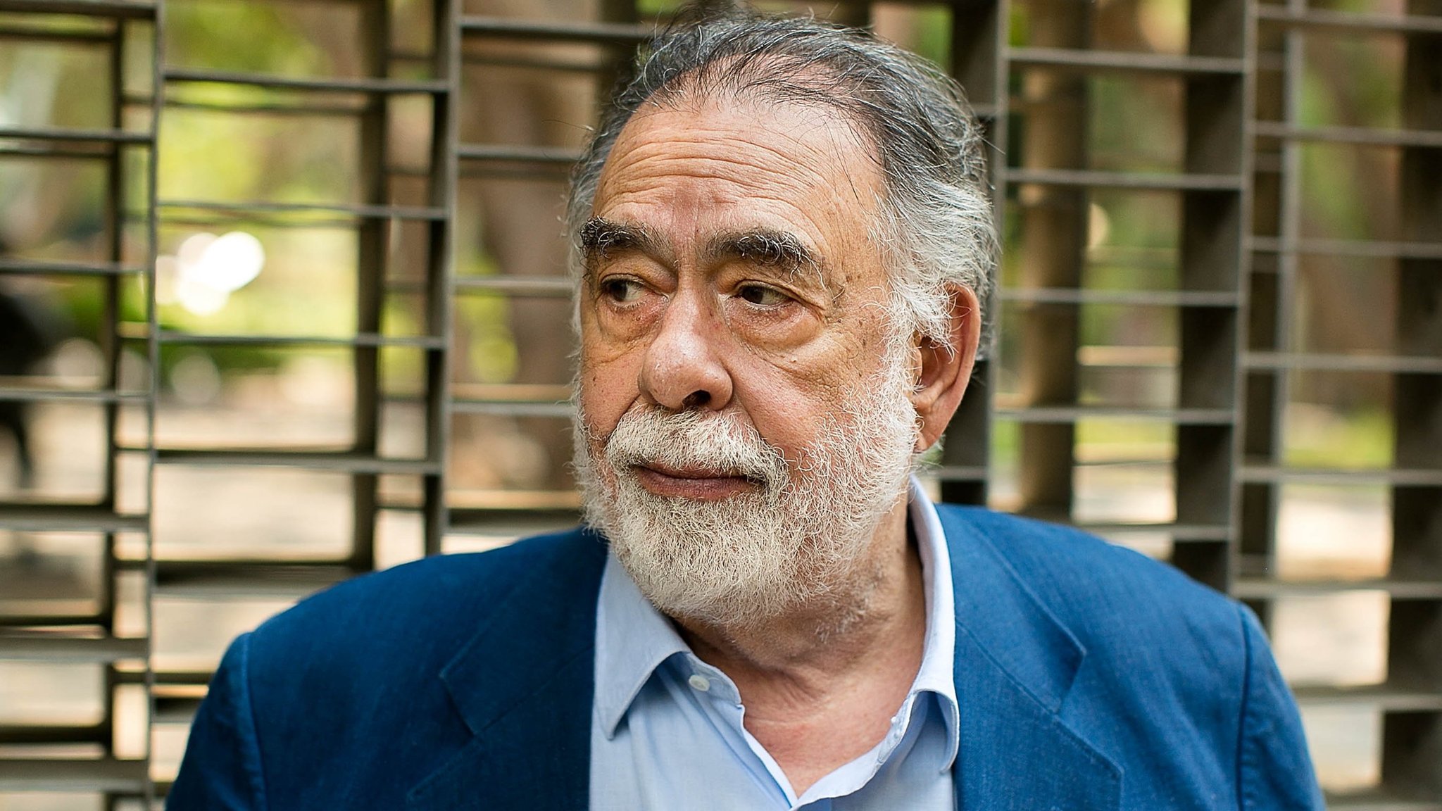Francis Ford Coppola wearing blue suit