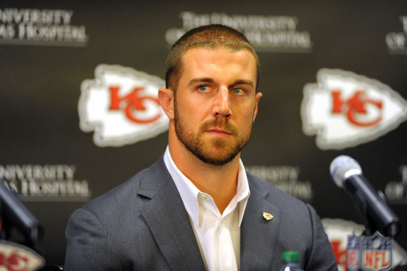 Alex Smith wearing gray suit