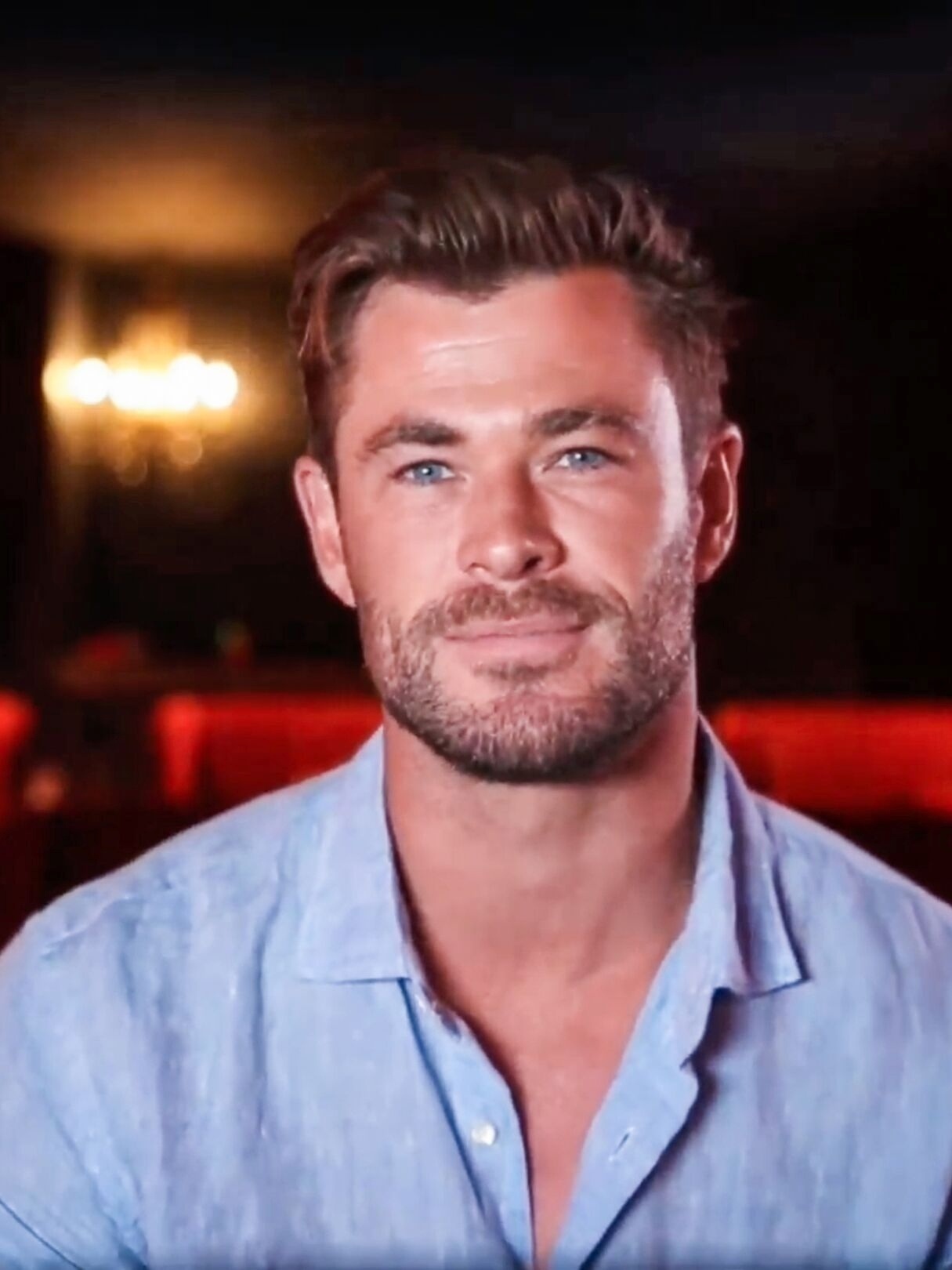 Chris Hemsworth wearing a blue shirt