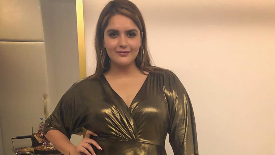 Anjali Anand in a shimmery dull golden dress