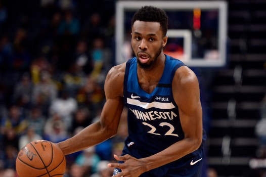 Andrew Wiggins paying basketball