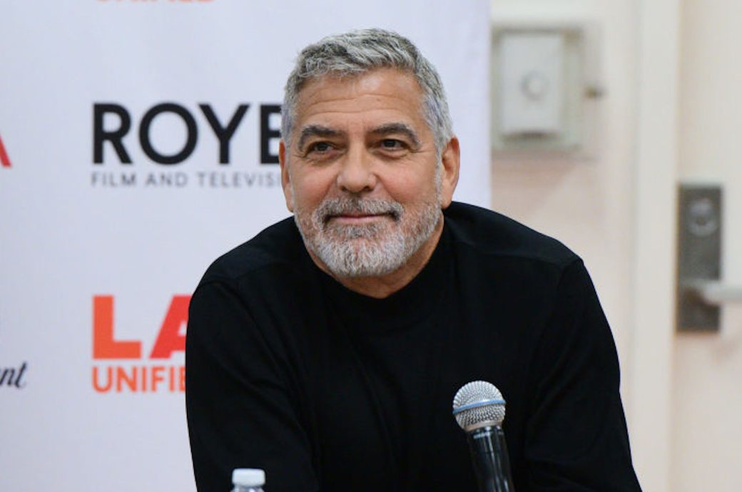 George Clooney wearing a black long sleeves