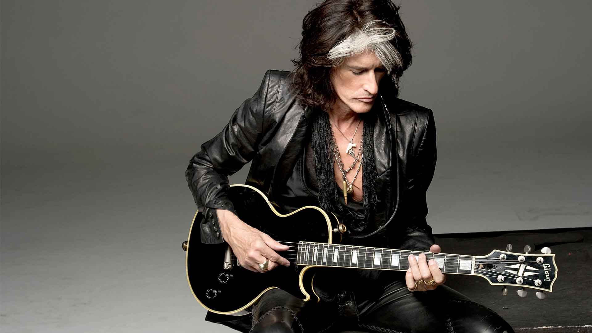 Joe Perry with his guitar