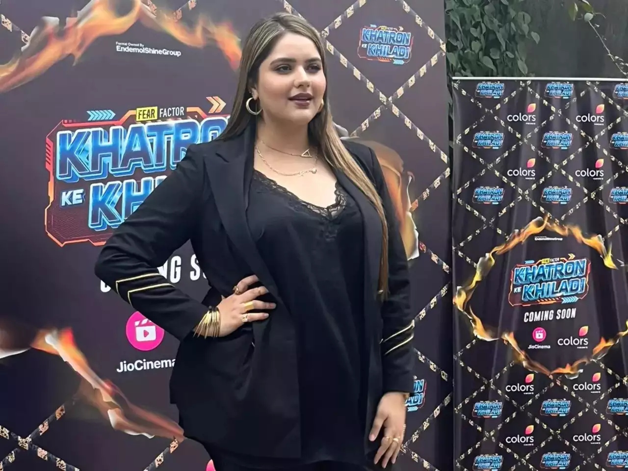 Anjali Anand in a black outfit